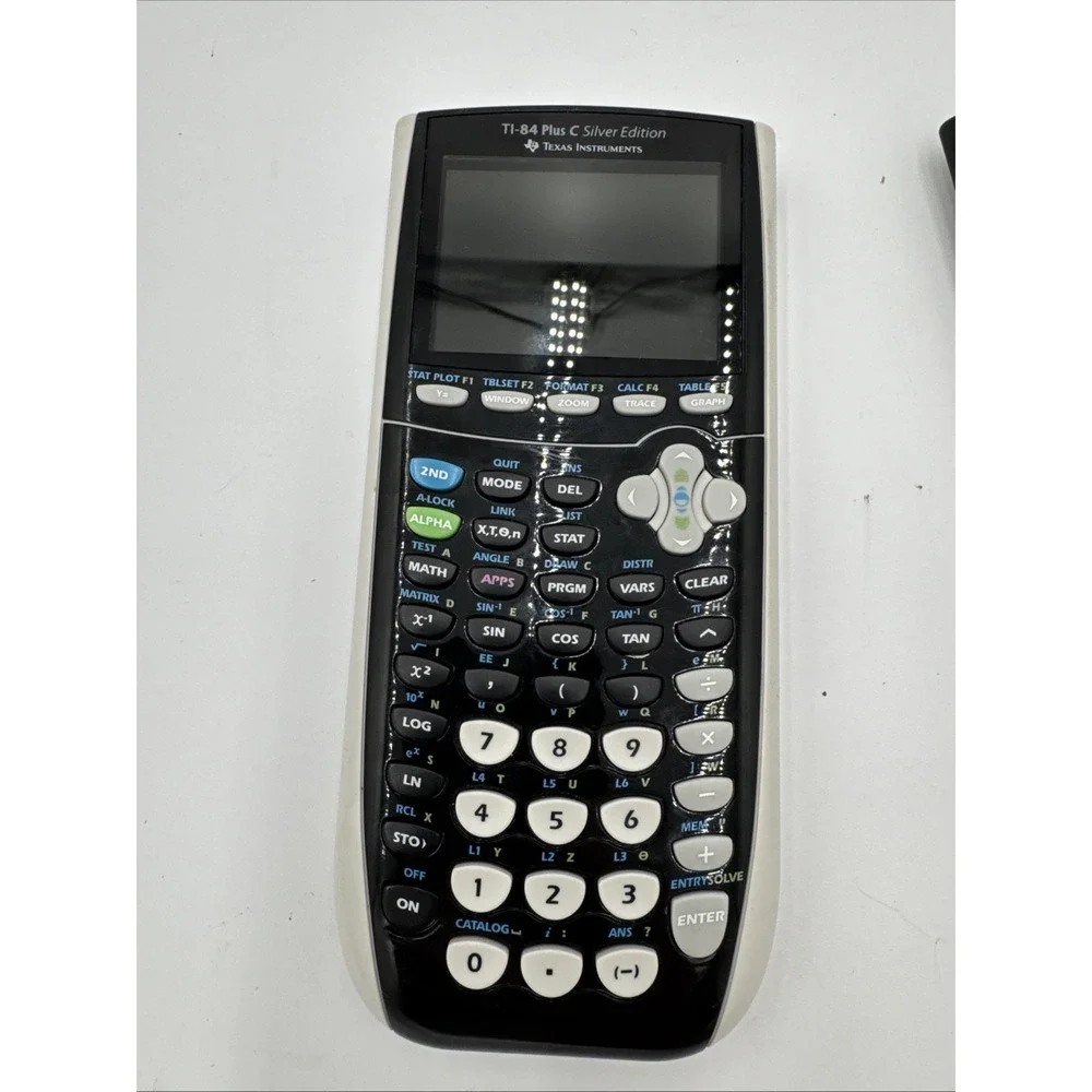 TI-84 Plus C Silver Edition Graphing Calculator‎ new battery, works well